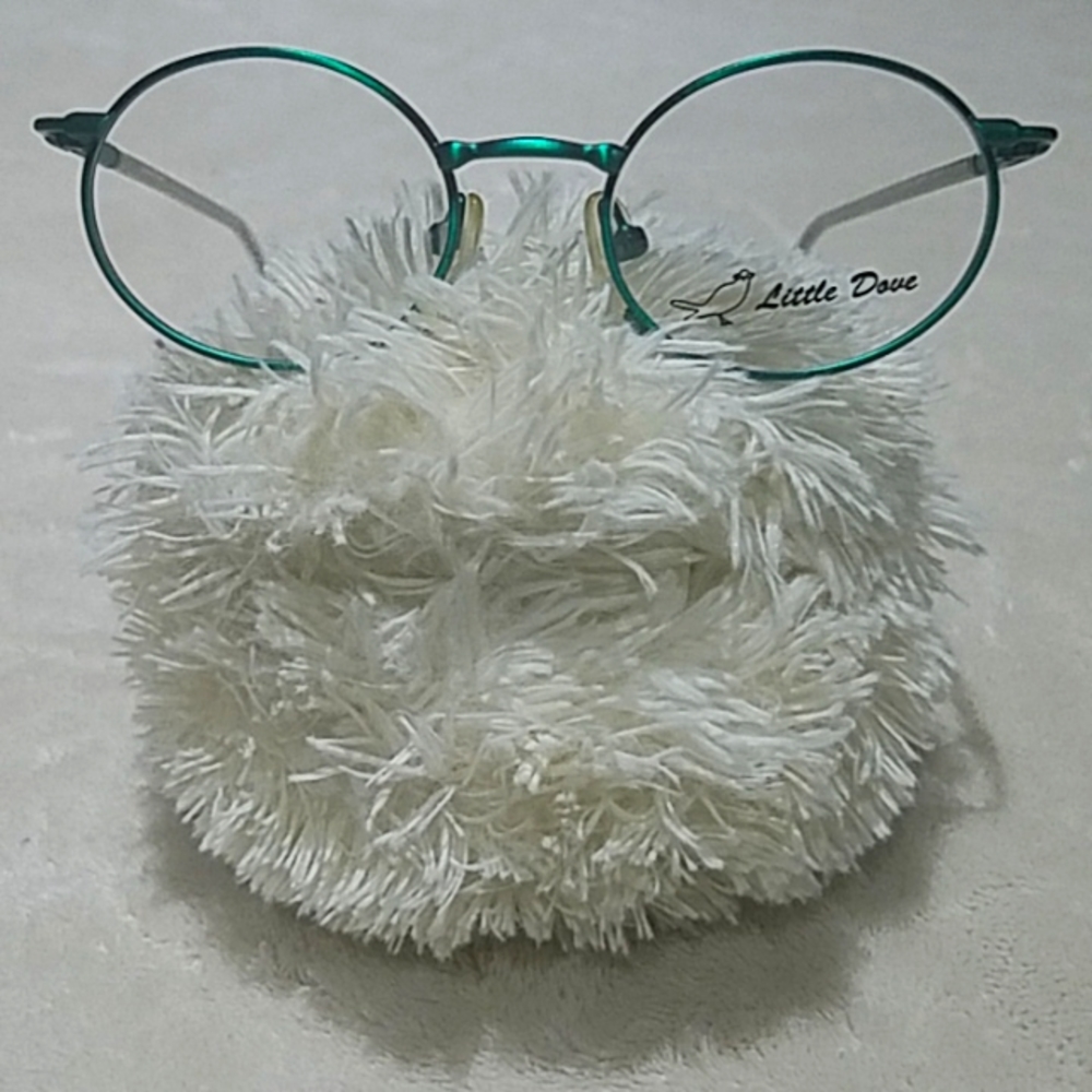 Green Metallic Glasses